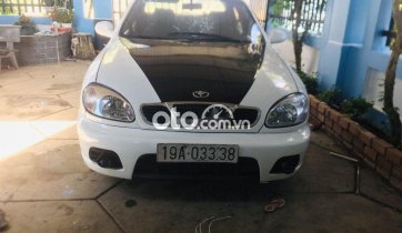 Bán xe Daewoo Lanos MT sản xuất 2002, màu trắng, giá tốt