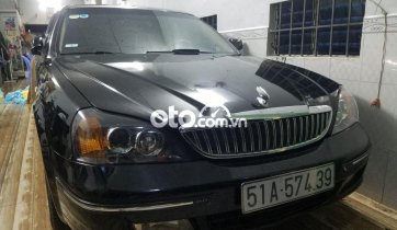 Cần bán xe Daewoo Magnus 2.0 năm 2005, màu đen, nhập khẩu nguyên chiếc, 148tr