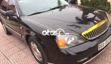 Cần bán xe Daewoo Magnus 2.5AT sản xuất 2004, màu đen, chính chủ