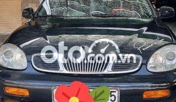 Cần bán gấp Daewoo Leganza sản xuất năm 2002, màu đen, xe nhập, 87tr