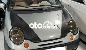 Xe Matiz che nắng che mưa mùa bão